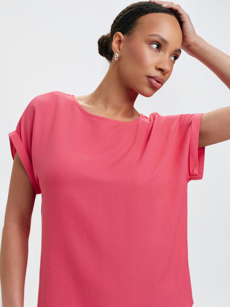 Różowa bluzka z wydłużonym tyłem 