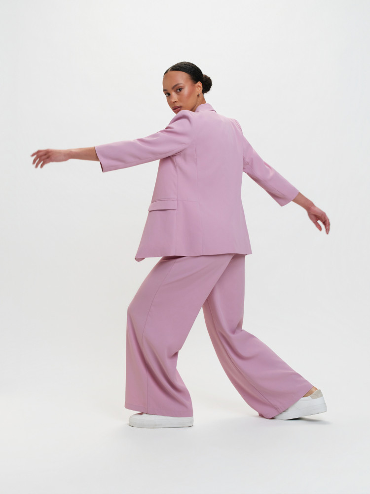 Eleganckie spodnie z wiązaniem róż 