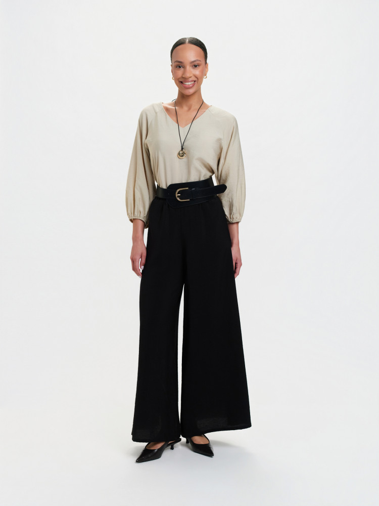 Czarne spodnie z szerokimi nogawkami 