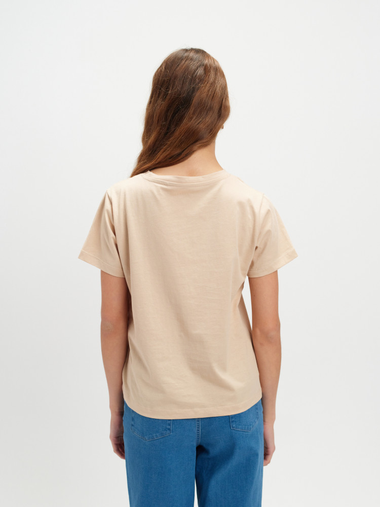 Beżowy top z grafiką 