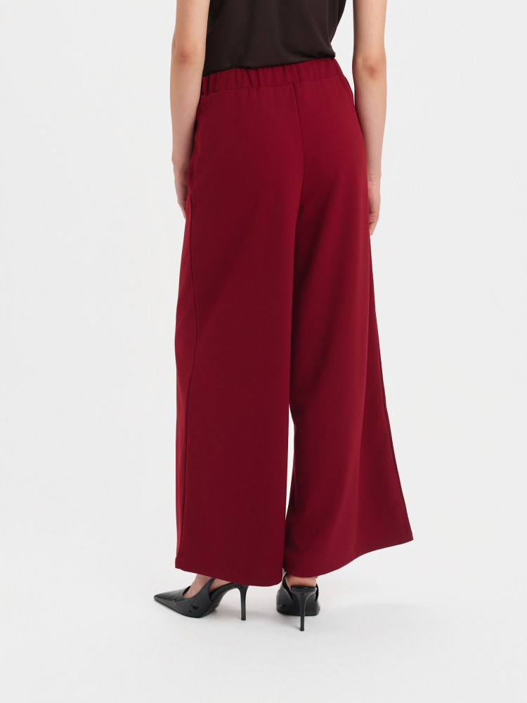 Szerokie spodnie z kantem burgund 