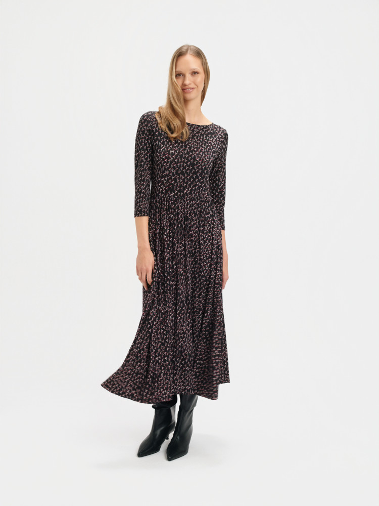 Zwiewna sukienka z plisowanym dołem 