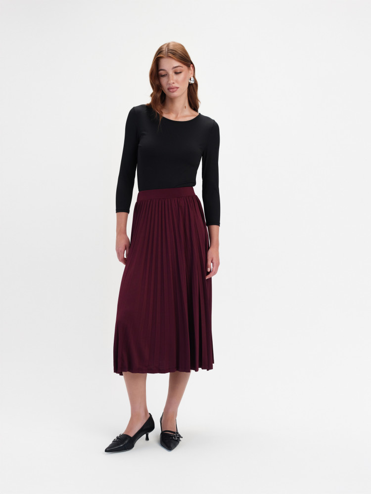 Czarny elastyczny top z długim rękawem 