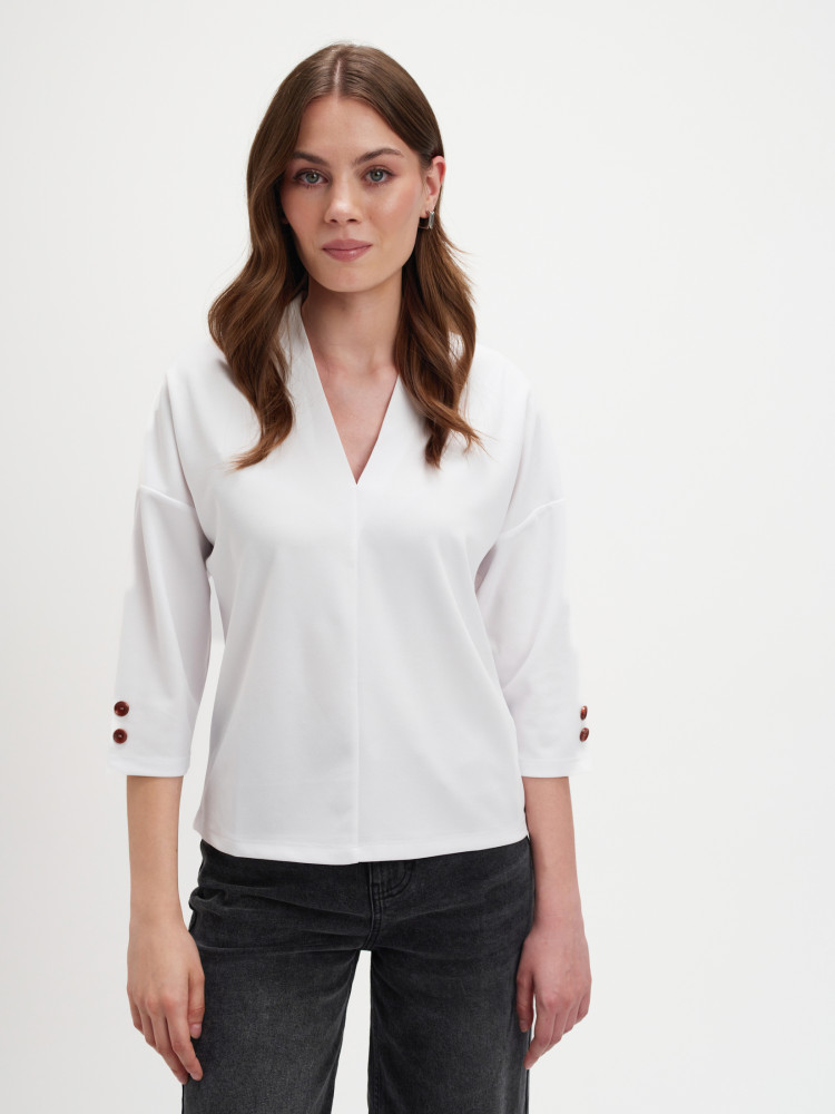 Biały top z dekoltem v-neck 