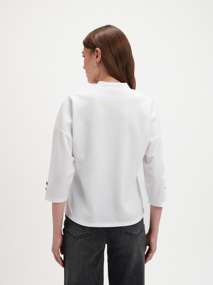 Biały top z dekoltem v-neck 