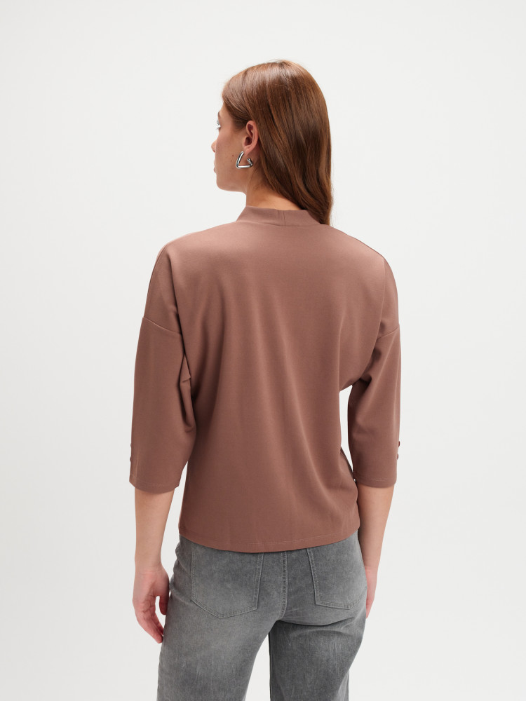 Beżowy top z dekoltem v-neck 