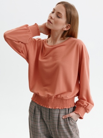 Krótka bluza zakończona szerokim ściągaczem