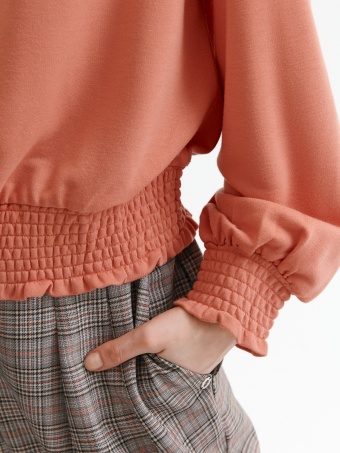 Krótka bluza zakończona szerokim ściągaczem