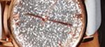 Elegancki zegarek z błyszczącą aplikacją