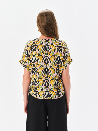 Żółta bluzka z efektownym printem 