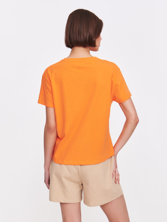 Pomarańczowy top z wytłaczaną grafiką 