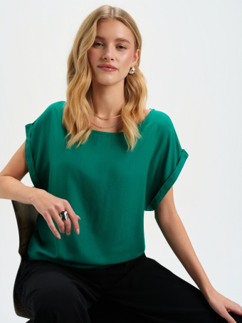 Zielona bluzka z gumką u dołu 