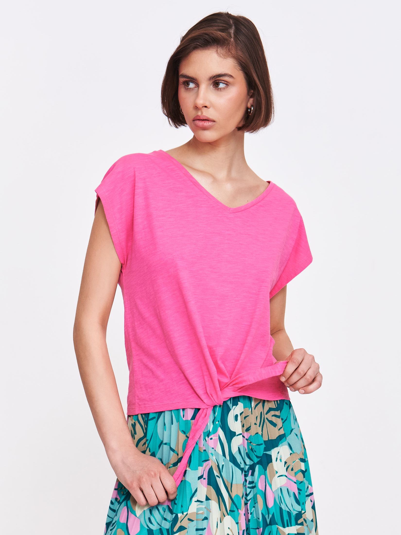 Różowy top z wiązaniem u dołu 