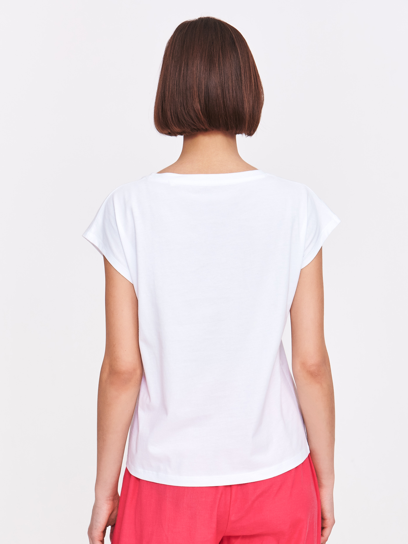 Biały top z grafiką z kwiatem 