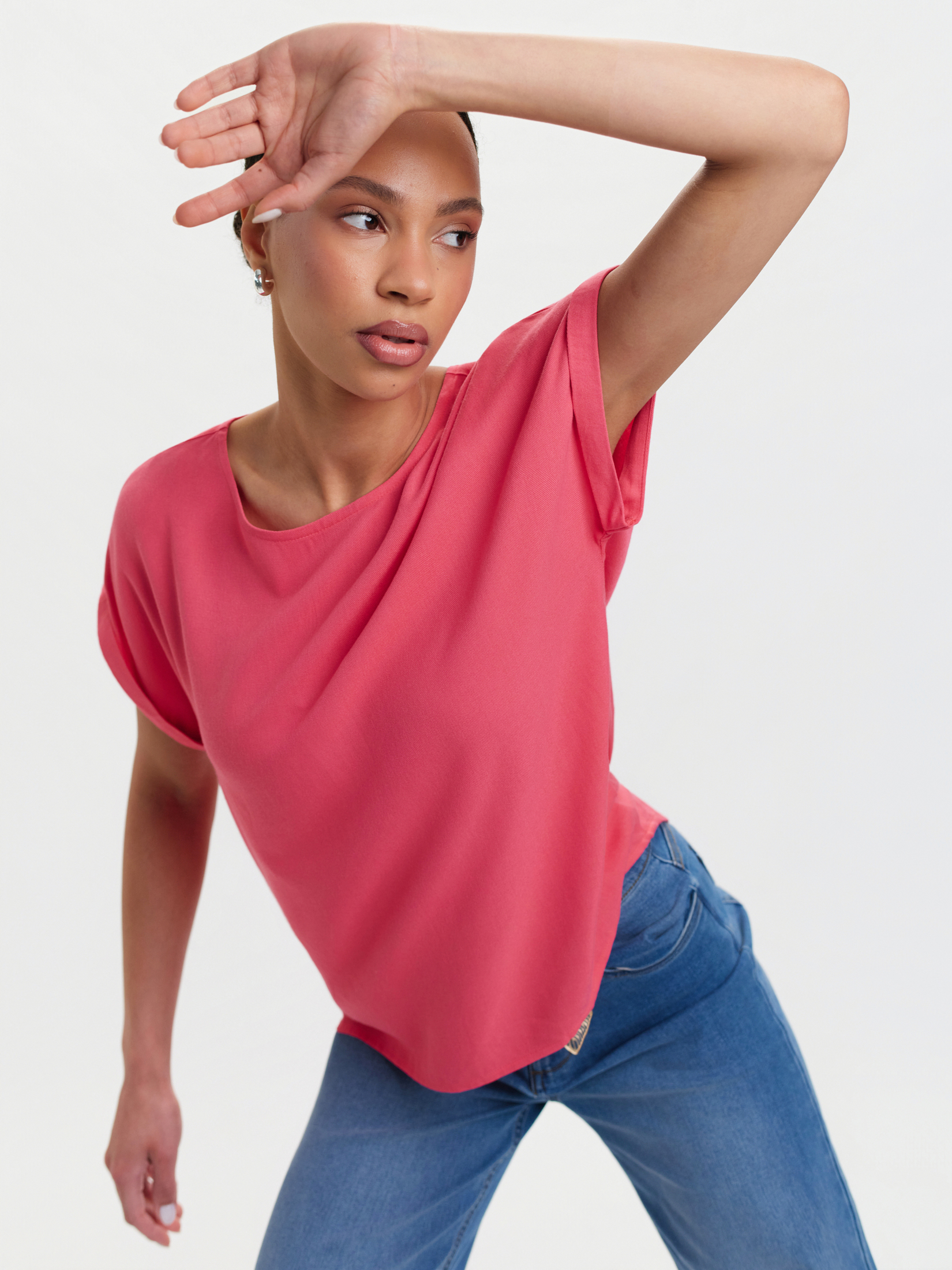 Różowa bluzka z wydłużonym tyłem 