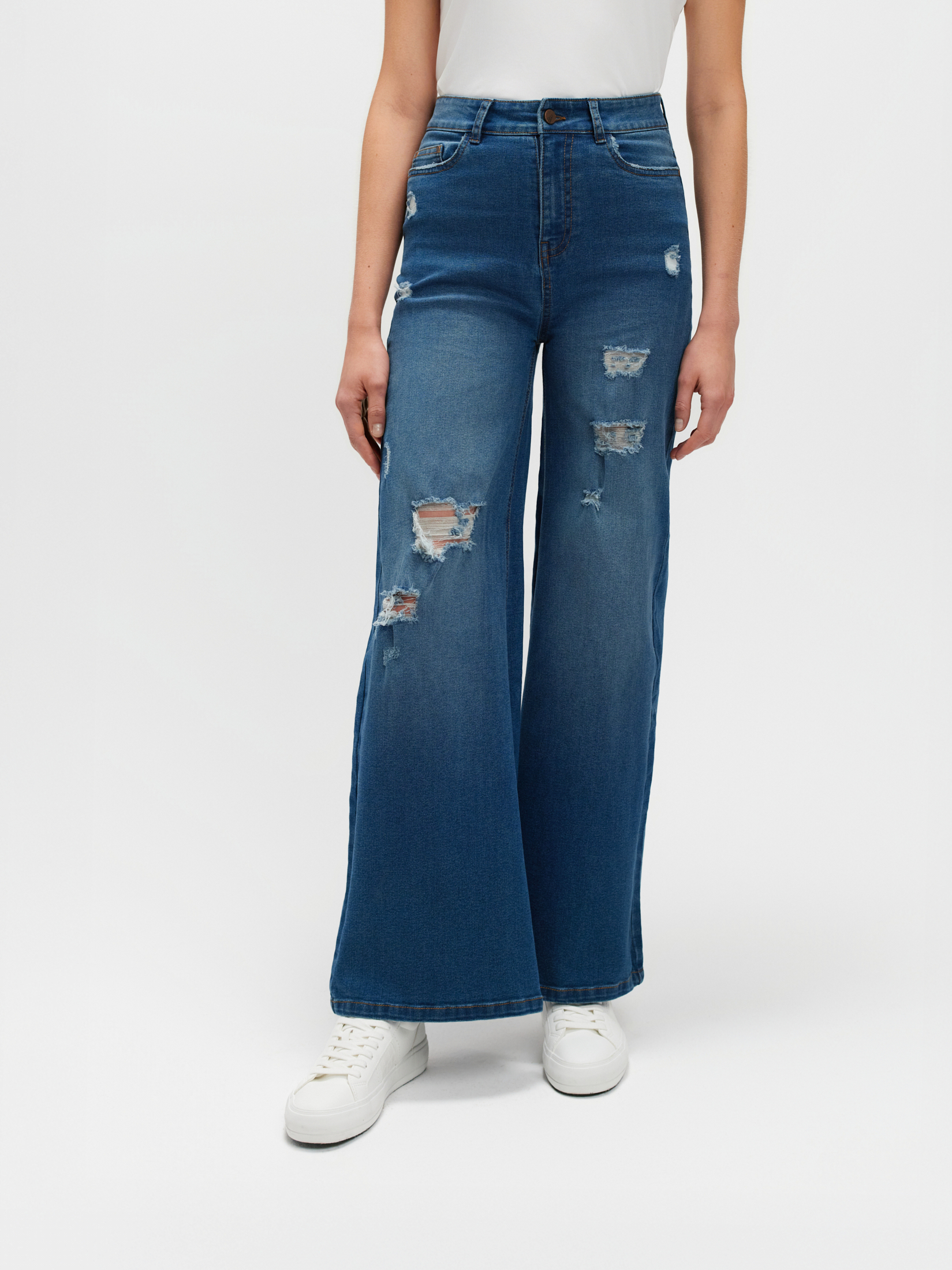 Granatowe jeansy wide leg z przetarciami 
