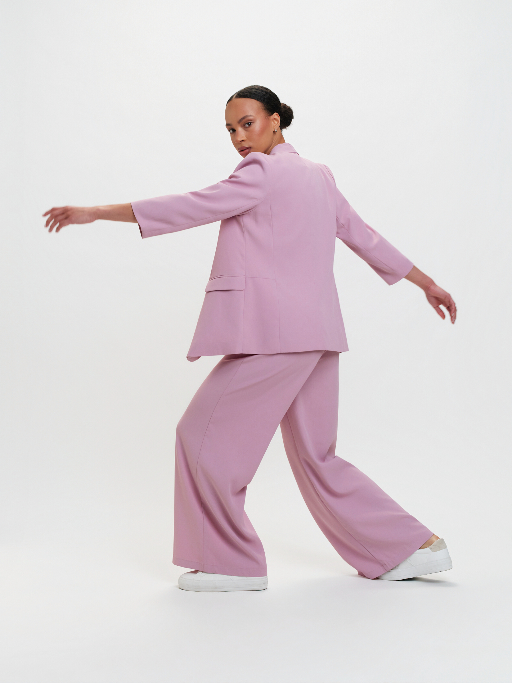 Eleganckie spodnie z wiązaniem róż 