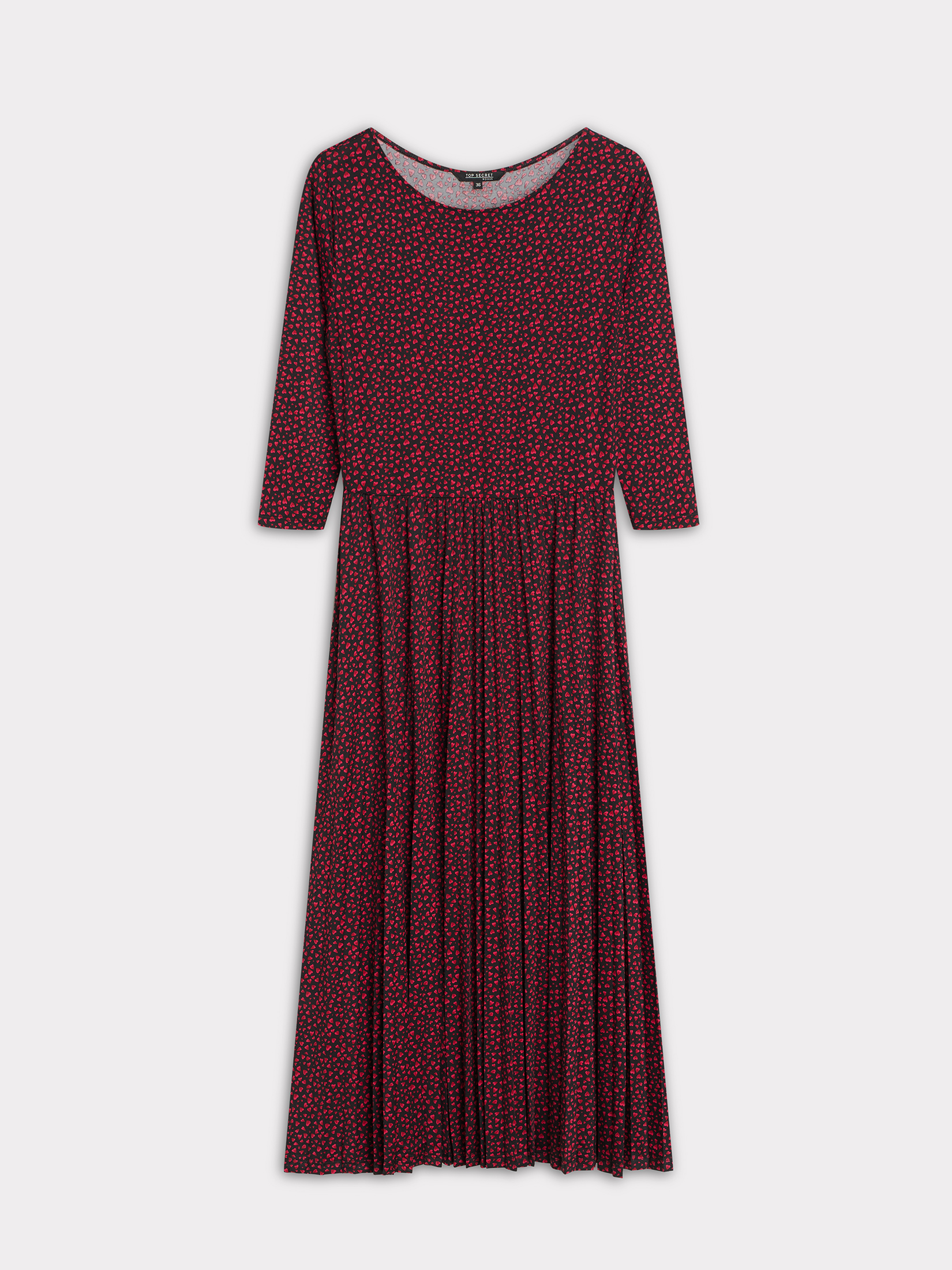 Wzorzysta sukienka z plisowanym dołem 